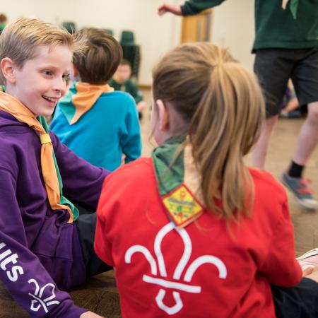 Boy and Girl Scouts chatting